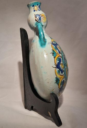 Moroccan tin glazed earthenware or faience pilgrim water flask antique 19th century hand painted with polychrome Arabesque foliate geometric pattern  727 grammes  9 inches long 6.5 inches wide  3 5/8 inches deep