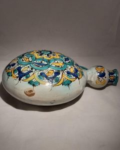 Moroccan tin glazed earthenware or faience pilgrim water flask antique 19th century hand painted with polychrome Arabesque foliate geometric pattern  727 grammes  9 inches long 6.5 inches wide  3 5/8 inches deep
