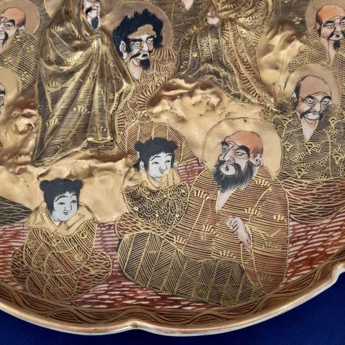 detail Hotei - Japanese Satsuma Pottery Low relief Moulded Plate Painted Immortals or Lucky Gods with Halos marked Satsuma & Shimazu mon - Antique Meiji circa 1900