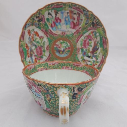 back or handle view of the cup  - saucer on a stand