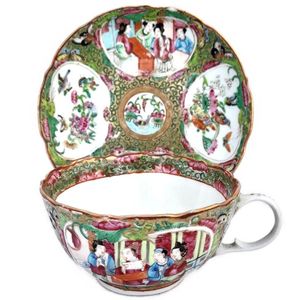 Teacup front with saucer on  a stand