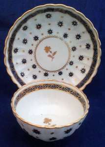 Chamberlains Worcester Porcelain Gilded Star Pattern Tea Bowl & Saucer ca 1790