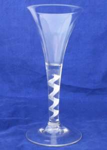 Antique Georgian air twist wine glass or goblet with a corkscrew single series cable twist stem trumpet bowl and conical foot with snapped pontil c 1750