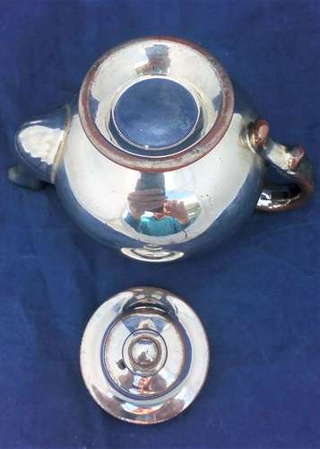 Victorian antique platinum lustre teapot with a shouldered round body on a pedestal foot and with a low collar, it is bachelor sized circa 1840
