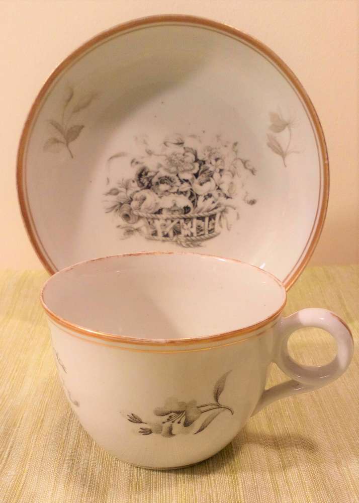 New Hall Hard Paste Porcelain Bute Shaped Cup and Saucer Bat Printed Floral Basket Pattern circa 1810
