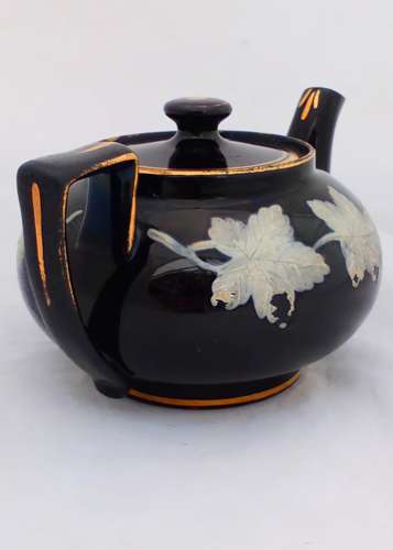 Victorian black glazed teapot with white enamelled vine leaves and stems antique circa 1850