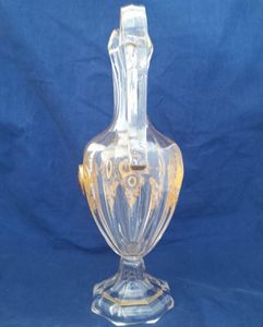 Antique Bohemian ruby red jewelled and gilded clear cut glass pedestal footed hexagonal oviform water jug circa 1870 34.5 cm high 12.8 cm diameter weighs 1246 grammes unpacked 900 ml capacity