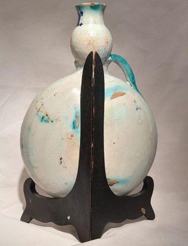 Moroccan tin glazed earthenware or faience pilgrim water flask antique 19th century hand painted with polychrome Arabesque foliate geometric pattern  727 grammes  9 inches long 6.5 inches wide  3 5/8 inches deep