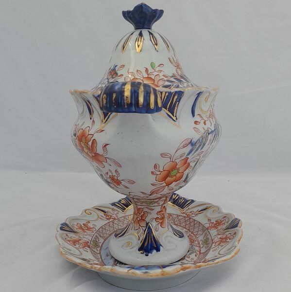 An antique Hicks & Meigh Japan pattern moulded moustache shaped ironstone sauce tureen and stand circa 1820 - underglaze blue & gilded enamel Imari pattern 19.1 cm high weighs  889 grammes unpacked.