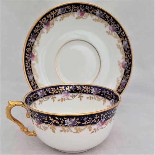 left image - Antique porcelain tea cup & saucer hand painted blue rim & swagged pink roses by W. Lambert 1915 - Larcombe King St Derby on a Bishop & Stonier Blank