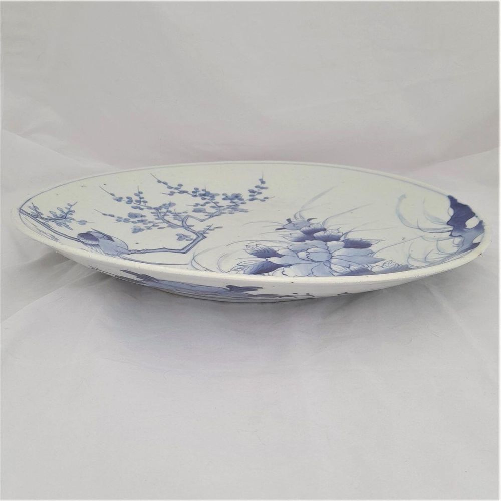 side view bottom left - Large Japanese Arita Porcelain Charger Painted Blue & White Bird of Paradise in Prunus Tree - antique circa 1870 19th C Meiji 41 cm diameter 2.29 kg