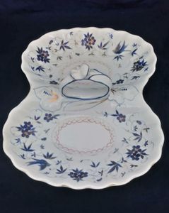 Antique German porcelain hors d'ouevres dish with loop handle decorted with blue flowrs and birds with gided highlights. Marked on the base KPM for Krister Porzellan-Manufaktur of Waldenburg circa 1860.