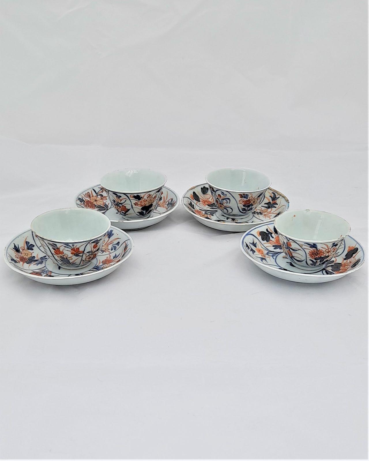 A very attractive set of four antique Japanese Arita porcelain tea bowls and saucers hand painted in an Imari pattern and dating we believe from the 18th century around 1730 during the Edo period (1603 - 1867).