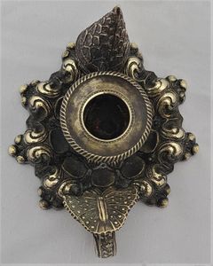 Antique cast brass taper stick holder and snuffer small chamber stick with a butterfly handle Mid 19th Century