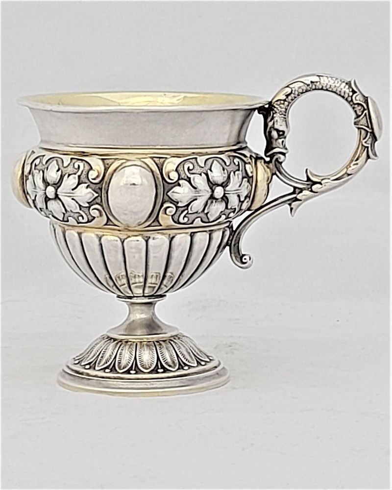 Antique early 19th century Silver gilt vermiel French Empire style campana shaped cup with ornate floriate repousse decoration sea serpent handle unmarked circa 1815