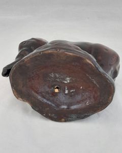 An antique novelty pottery elephant money box with a Rockingham type brown treacle glaze dates to the early 19th century - piggy bank in the form of a Jumbo elephant circa 1830 10. 3 cm high 12.6 cm long