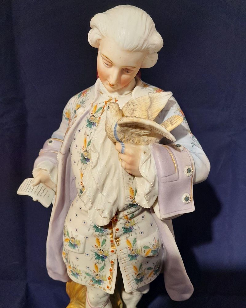 An antique French Old Paris enamelled bisque porcelain figurine young man with a dove on an oval faux marble base circa 1880 - 37 cm high - 2.58 Kg Probably Chantilly