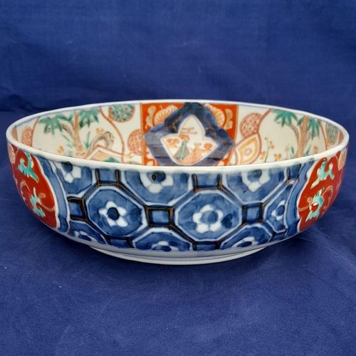 side right front kikko - Japanese Arita porcelain Imari pattern Bowl with Central Kirin & garden scenes - the base with double foot ring - antique late Edo period 19th C