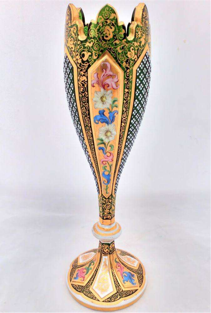 An antique Bohemian Cut Green Overlay Glass Vase Gilded Panels Enamelled flowers and cross cut panels circa 1865