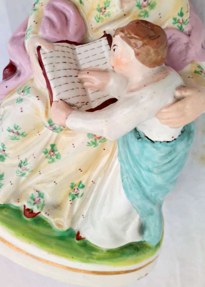 Antique Staffordshire Figurine The seated Prudent Mother and Child Reading circa 1850