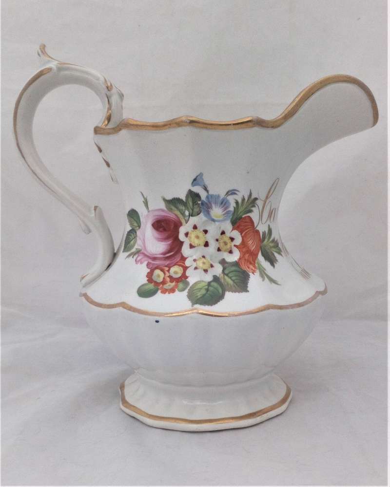 Antique Isaac Baguley Rockingham Porcelain Quart Jug with a scrolling gilt inscription Caroline Sanderson Sheffield 1847  capacity of two pints or a quart.