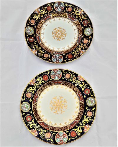 An antique pair of Ashworth Brothers Real Ironstone China Dinner Plates transfer printed and hand coloured in an Imari style pattern number B 1304 circa 1870