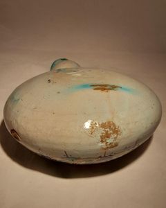 Moroccan tin glazed earthenware or faience pilgrim water flask antique 19th century hand painted with polychrome Arabesque foliate geometric pattern  727 grammes  9 inches long 6.5 inches wide  3 5/8 inches deep