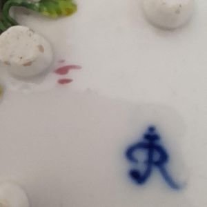 Mark close up - Dresden porcelain cup & saucer applied flowers hand painted insects antique late 19th C - lobed shape on six stilt feet - Meissen style - monogram JR