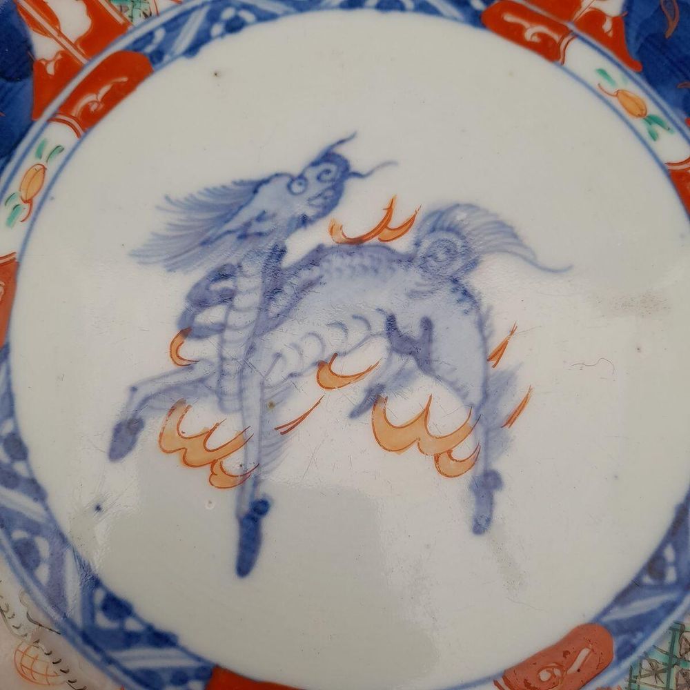 detail central image of the Kirin - Japanese Arita porcelain Imari pattern Bowl with Central Kirin & garden scenes - the base with double foot ring - antique late Edo period 19th C