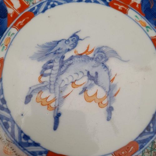 detail central image of the Kirin - Japanese Arita porcelain Imari pattern Bowl with Central Kirin & garden scenes - the base with double foot ring - antique late Edo period 19th C