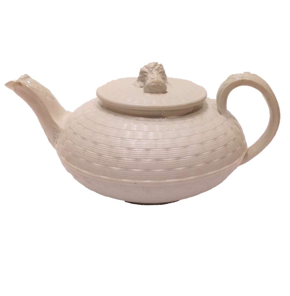 An antique Wedgwood white salt glazed stoneware teapot basket weave pattern with Wheat Sheaf finial circa 1825