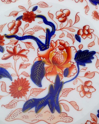 An antique Regency period porcelain 8 inch diameter dessert plate hand painted in an Imari tree Japan pattern early 19th century circa 1815.