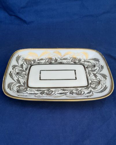 An antique Thomas Rose Coalport London shaped hybrid hard paste porcelain tea pot stand gilded pattern 1149 dating from the Regency period circa 1812.