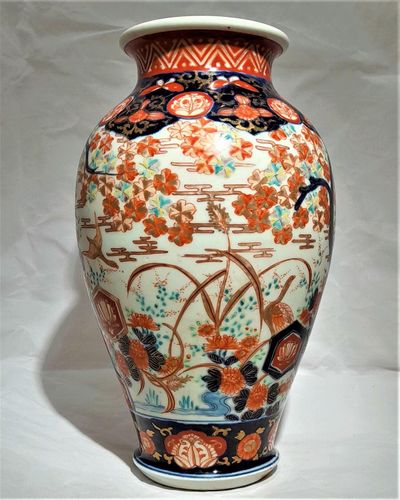 Japanese antique Arita porcelain vase from the Meiji Period decorated in the Imari palette with painted geese trees blossom kikko mons 19th C 24.5 cm
