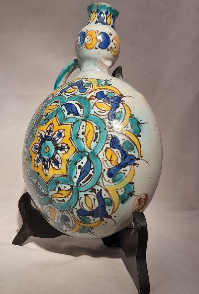 Moroccan tin glazed earthenware or faience pilgrim water flask antique 19th century hand painted with polychrome Arabesque foliate geometric pattern  727 grammes  9 inches long 6.5 inches wide  3 5/8 inches deep