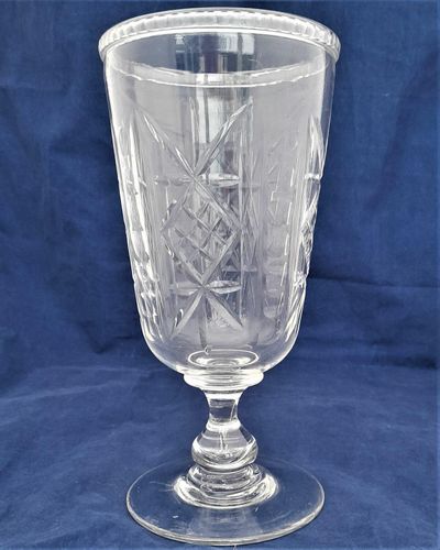 Antique Victorian Cut Glass Celery Vase with Folded Rim to a Bell Shaped bowl on a Baluster Stem and plain foot - circa 1870 21 cm high 10 cm diameter