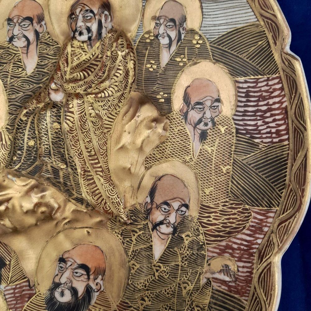 detail Kokūzō Bosatsu- Japanese Satsuma Pottery Low relief Moulded Plate Painted Immortals or Lucky Gods with Halos marked Satsuma & Shimazu mon - Antique Meiji circa 1900
