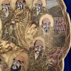 detail Kokūzō Bosatsu- Japanese Satsuma Pottery Low relief Moulded Plate Painted Immortals or Lucky Gods with Halos marked Satsuma & Shimazu mon - Antique Meiji circa 1900