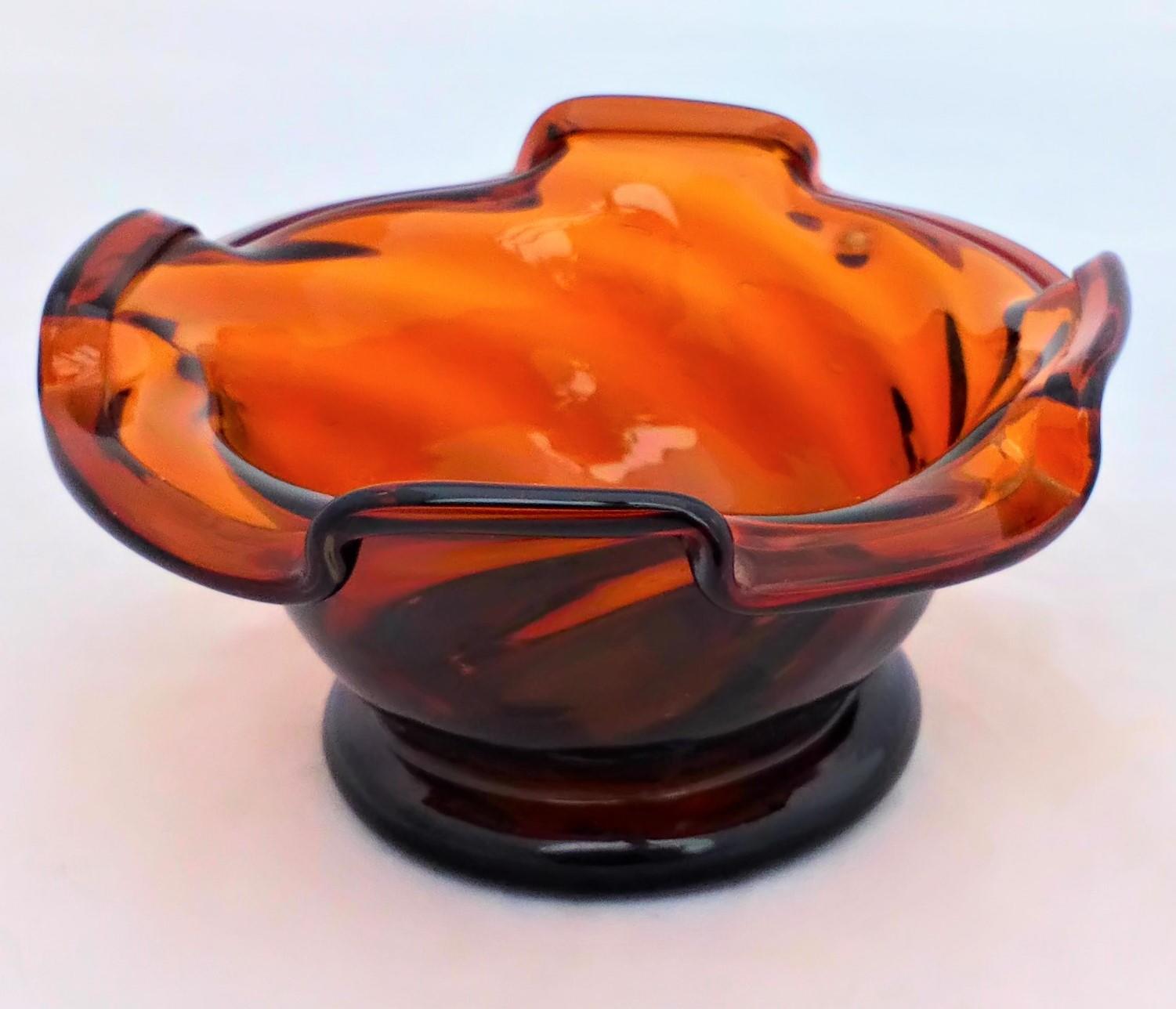 Antique Victorian amber glass wrythen sweetmeat bowl or pan with a pinched and folded rim circa 1850
