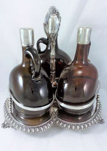 Set of Three Decanters on Stand Victorian Amber Glass and Silver Plate c 1870