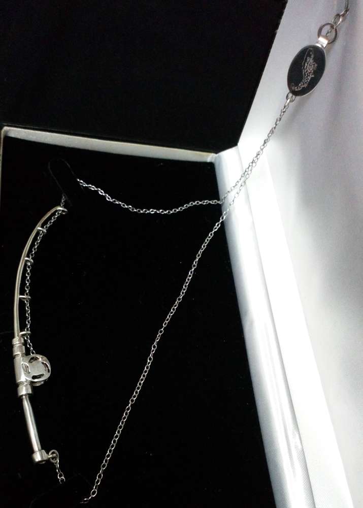 Unique vintage craftsman made realistically modelled silver fly fishing rod necklace engraved salmon on the clasp.