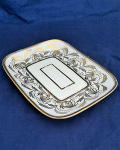 An antique Thomas Rose Coalport London shaped hybrid hard paste porcelain tea pot stand gilded pattern 1149 dating from the Regency period circa 1812.