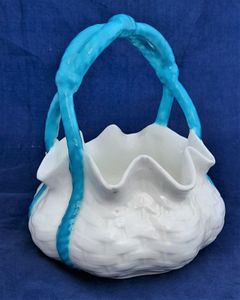 An antique moulded porcelain basket shaped posy bowl with turquoise enamel painted handle and pinched rim. It is unmarked other than the pattern number 1/536 painted on the base in iron red enamel. This pretty item dates to the Victorian era in the late 19th century circa 1875. 11.5 cm diameter , 13.4 cm high