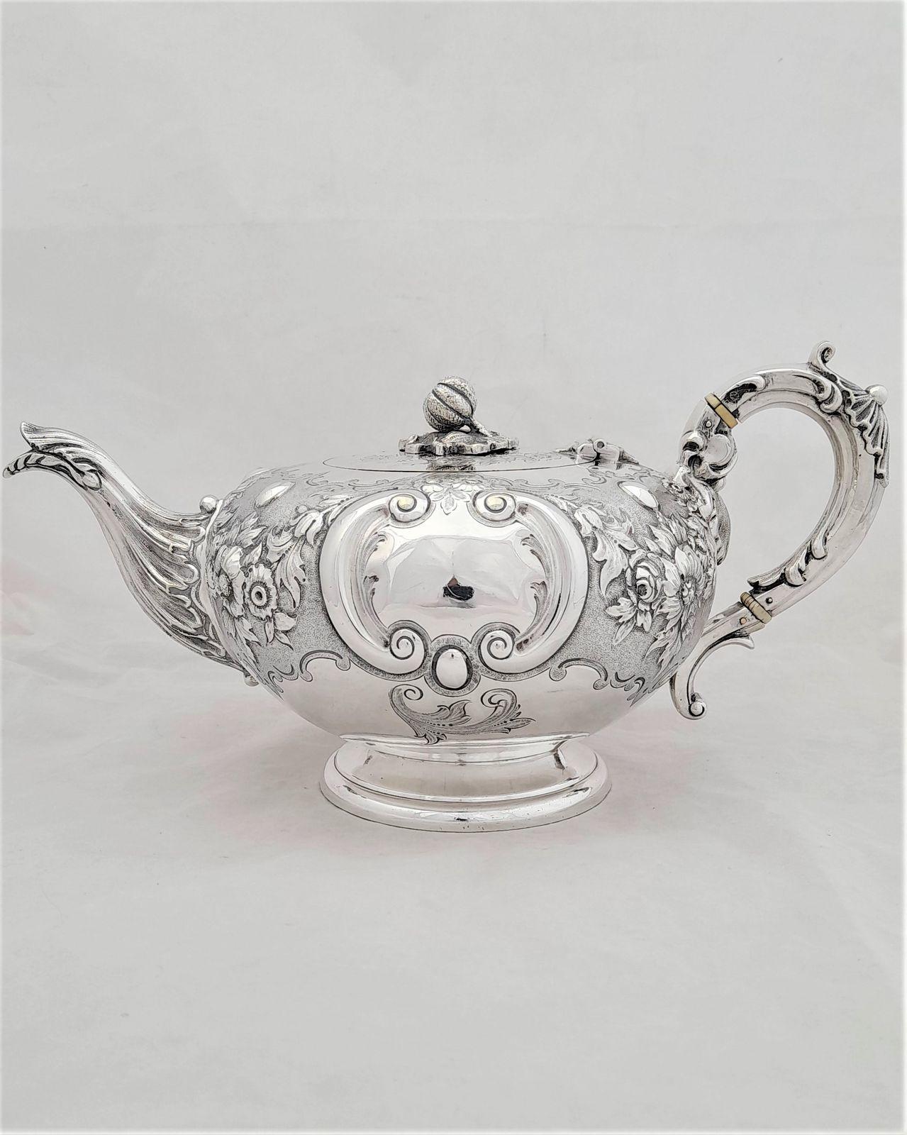 An antique early Victorian Mappin & Webb silver plated melon shaped tea pot with repousse floral decoration acanthus scroll spout and handle and cast melon shape knob on the lid. Capacity 2.5 pints, date circa 1865.