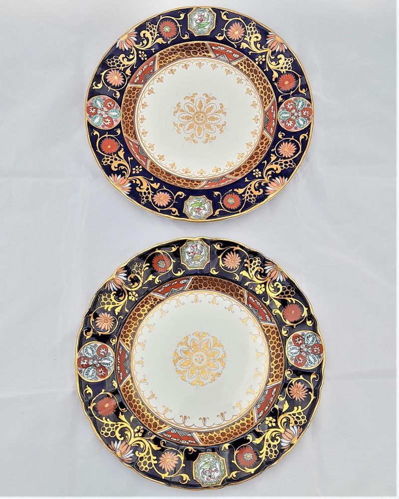 An antique pair of Ashworth Brothers Real Ironstone China Dinner Plates transfer printed and hand coloured in an Imari style pattern number B 1304 circa 1870