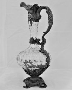 French ornate gothic scroll white metal mounted cut glass claret jug antique circa 1870 - shaft & globe shape decorated with thumb cuts & faceted neck 13 inches 1 1/2 pint capacity.