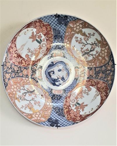 Large antique Japanese Arita porcelain charger decorated with hand painted hares & tree ferns  with a central dragon chasing a flaming pearl - circa 1870 in the 19th century Japanese Meiji period - 47 cm diameter 3.43 kg unpacked