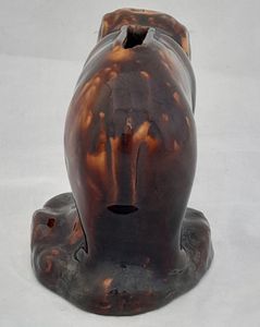 An antique novelty pottery elephant money box with a Rockingham type brown treacle glaze dates to the early 19th century - piggy bank in the form of a Jumbo elephant circa 1830 10. 3 cm high 12.6 cm long