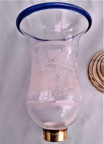 Pair of antique brass spring loaded hurricane candlesticks with grapevine etched glass shades with blue rim & cut glass prism lustre droppers 53 cm High 3.8 kg