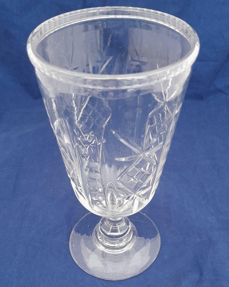 Antique Victorian Cut Glass Celery Vase with Folded Rim to a Bell Shaped bowl on a Baluster Stem and plain foot - circa 1870 21 cm high 10 cm diameter
